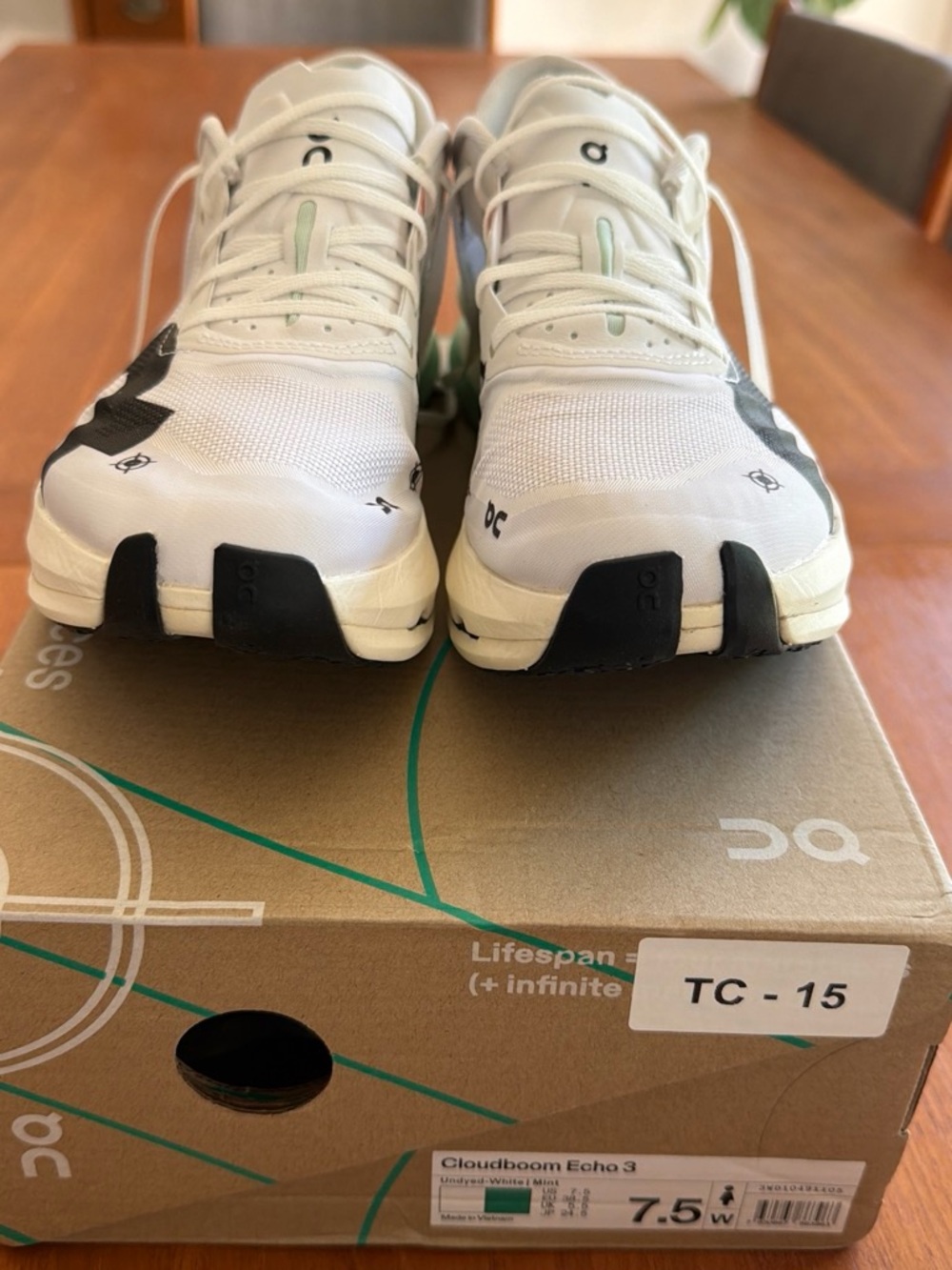 On Running White and Black Women’s Cloudboom Echo 3 Sneakers